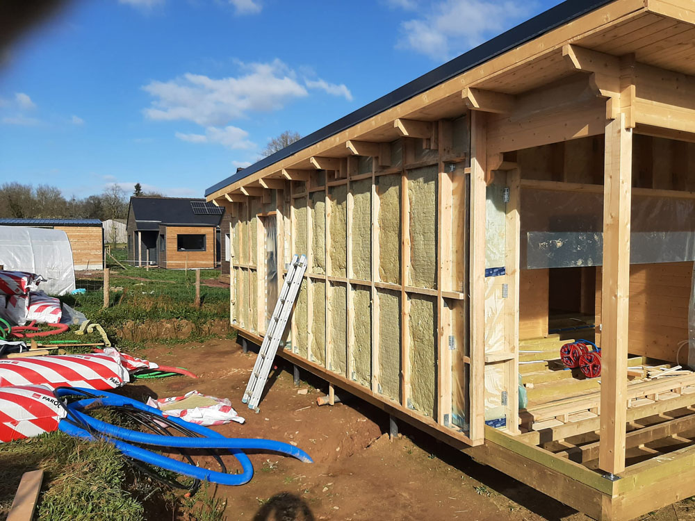 Isolation sous bardage d'un chalet en bois habitable