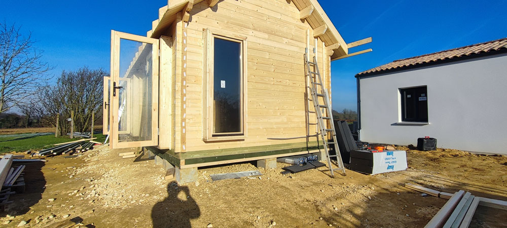 Montage structure et menuiseries chalet en bois